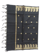 A Banarasi-inspired Black Art Silk Dupatta with Tassels by Ladylike Accoutre, displayed on a clean white background. Features gold zari butti floral motifs and an intricate paisley border.