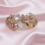 Gold-tone floral hair barrette with pink pearls and crystals, decorative hair clip for weddings, parties, and everyday hairstyles.