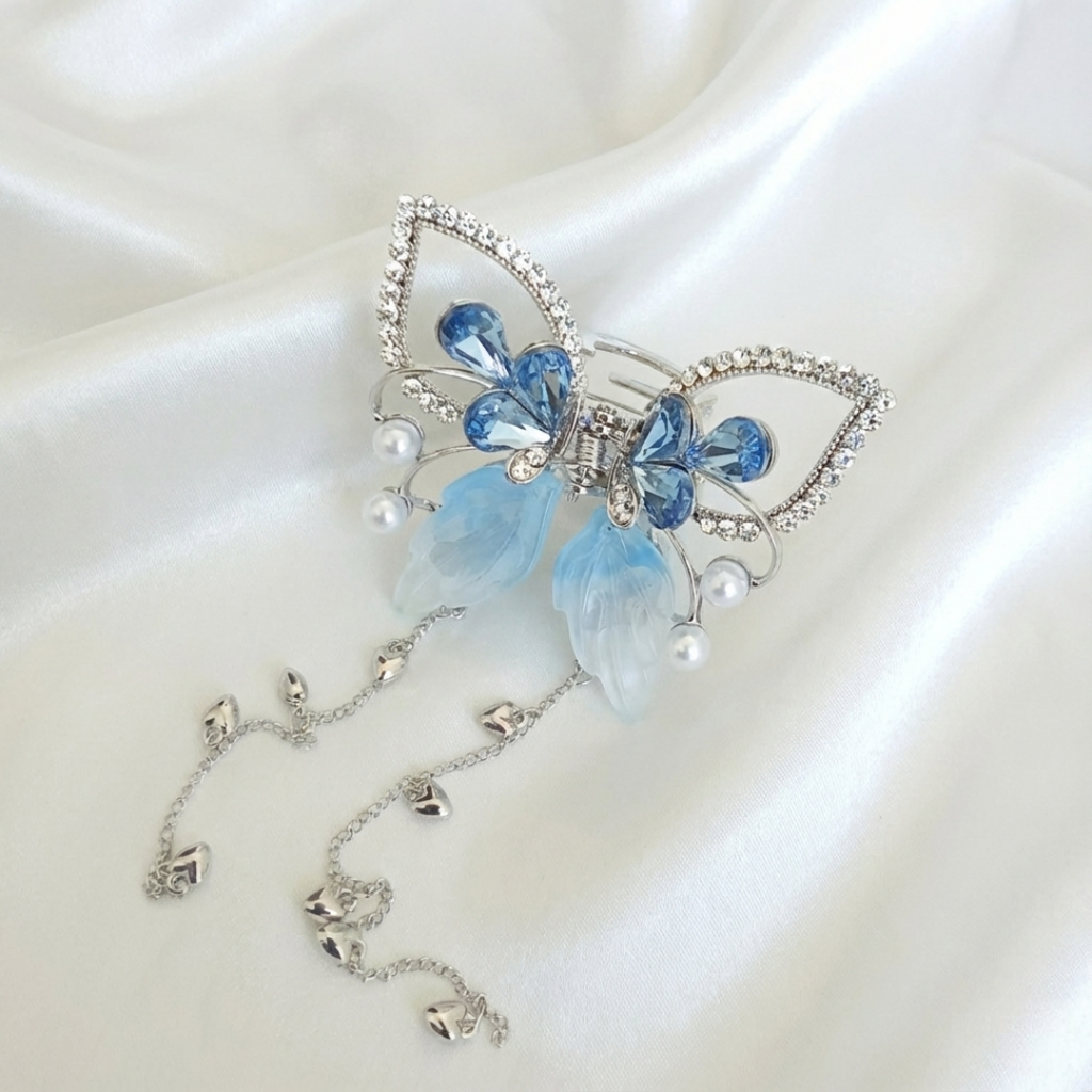 Silver-Tone Butterfly Hair Claw Clip with Blue Wings, White Pearls, Crystal Accents & Dangling Heart Chain by Ladylike Accoutre.