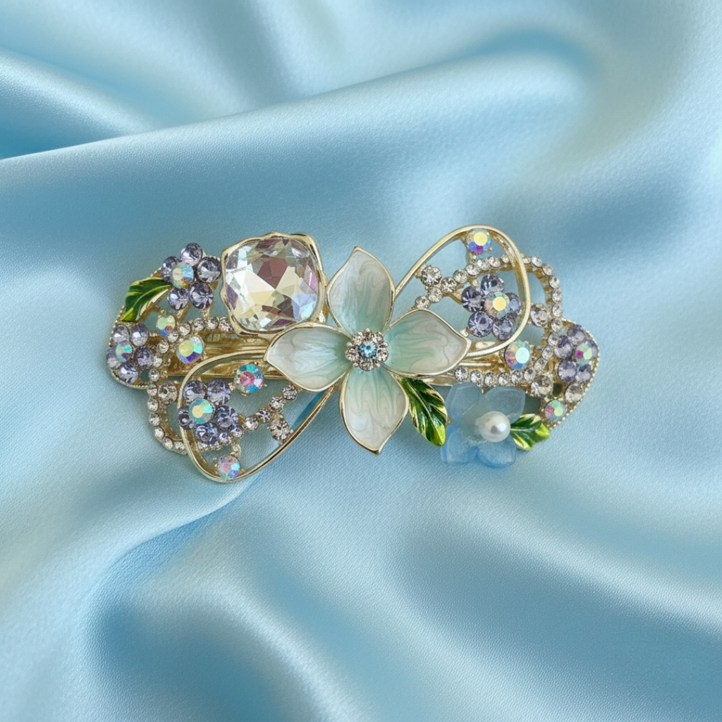 Gold-tone floral hair barrette with blue pearls and crystals, enamel petals, decorative hair clip for weddings, parties, and everyday hairstyles.