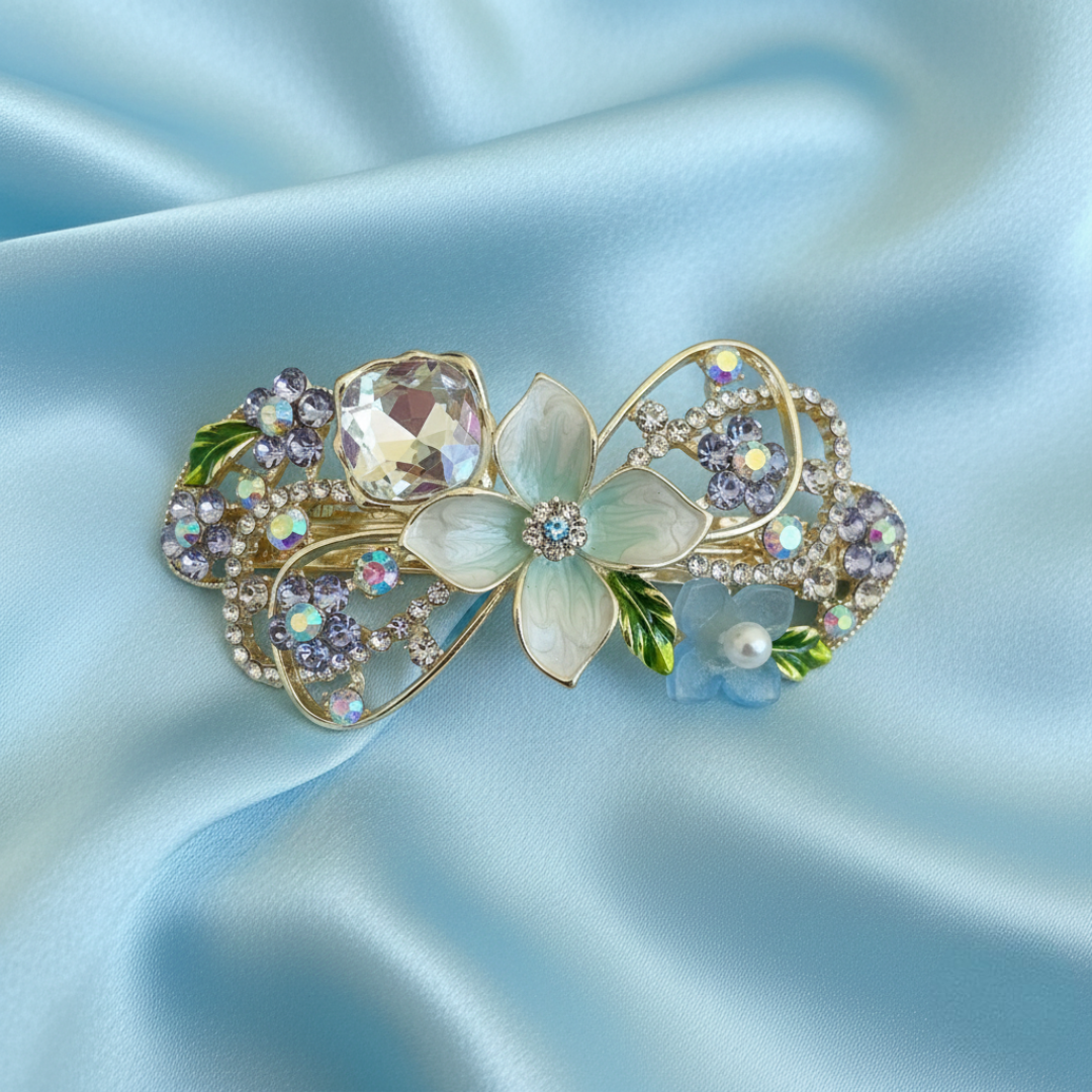 Gold-tone floral hair barrette with blue pearls and crystals, enamel petals, decorative hair clip for weddings, parties, and everyday hairstyles.