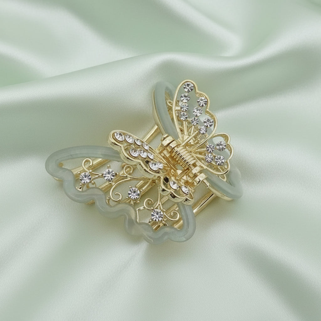 Gold-Tone Green Butterfly Hair Claw Clip. Featuring translucent resin wings and sparkling crystals curated by Ladylike Accoutre.