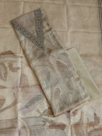 Cream Organza Unstitched Salwar Kameez with Embroidered Neck & Santoon Bottom