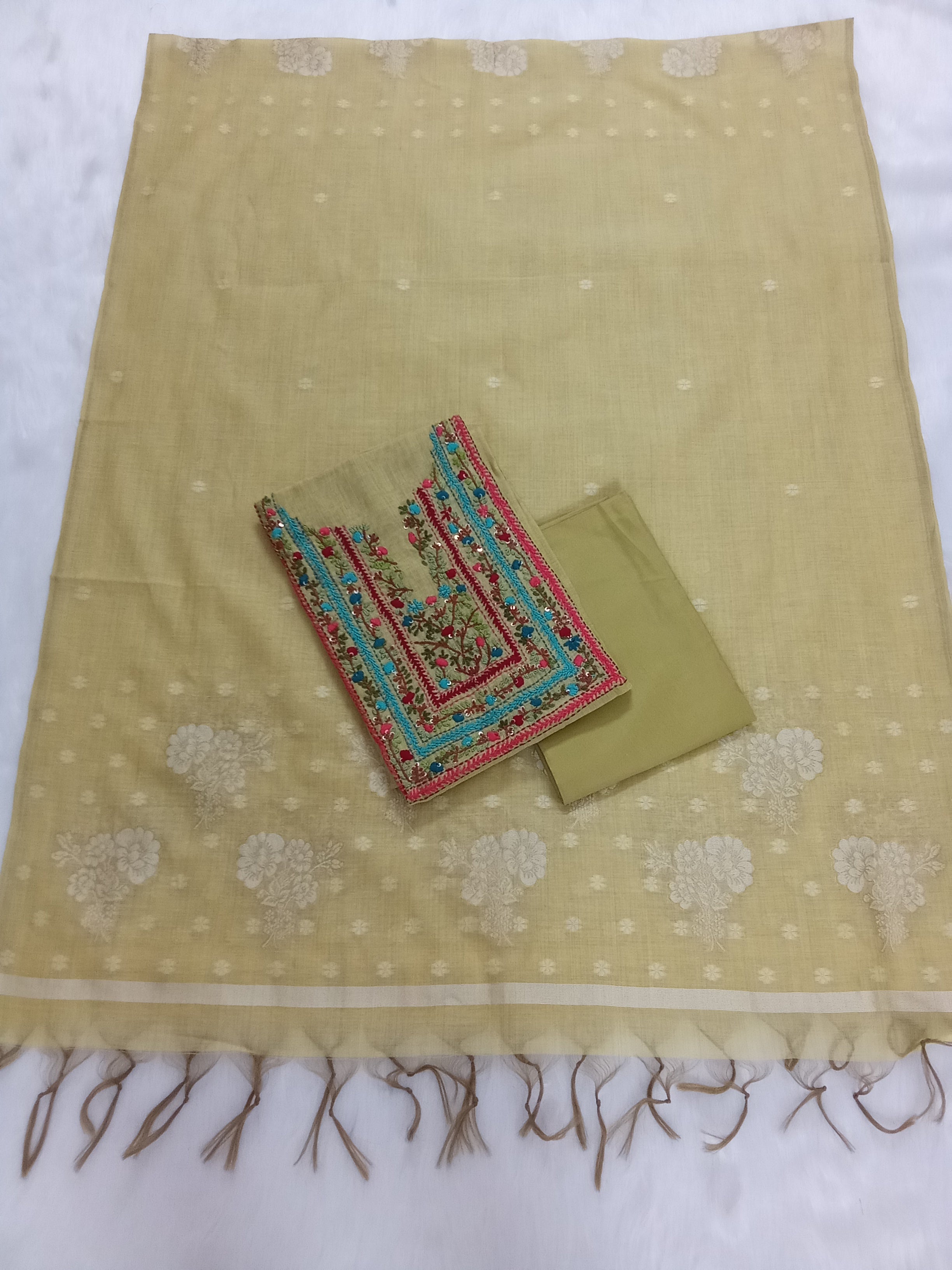 Yellowish-Green Jamdani Silk Salwar Kameez Suit with Hand-Embroidered Floral Neckline