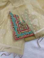 Yellowish-Green Jamdani Silk Salwar Kameez Suit with Hand-Embroidered Floral Neckline