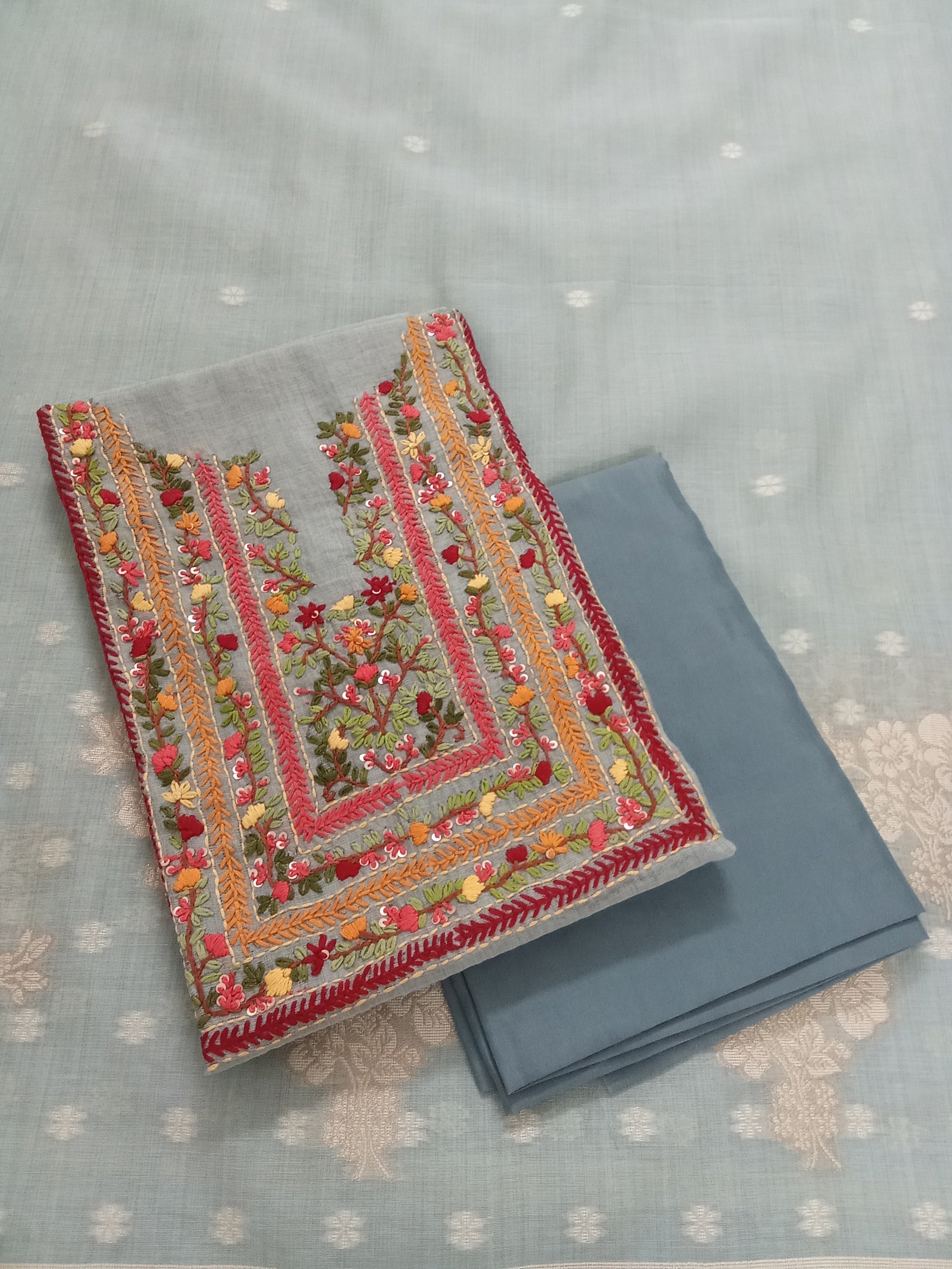 Mint-Green Jamdani Silk Salwar Kameez Suit with Hand-Embroidered Floral Neckline