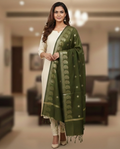 A model in cream salwar kameez wearing a Banarasi-inspired Sap Green Art Silk Dupatta with Tassels by Ladylike Accoutre, displayed on a clean white background. Features gold zari butti floral motifs and an intricate paisley border.