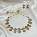 Gold-Tone Emerald-Green Kemp-Style Choker Jewellery Set with Matching Earrings and adjustable dori set on a cream shining background by Ladylike Accoutre