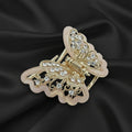 Gold-Tone Pink Butterfly Hair Claw Clip. Featuring translucent resin wings and sparkling crystals curated by Ladylike Accoutre.