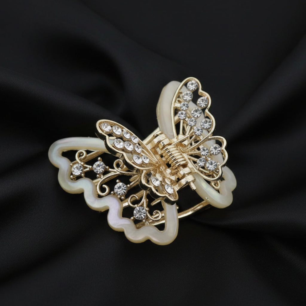 Gold-Tone White Butterfly Hair Claw Clip. Featuring translucent resin wings and sparkling crystals curated by Ladylike Accoutre.