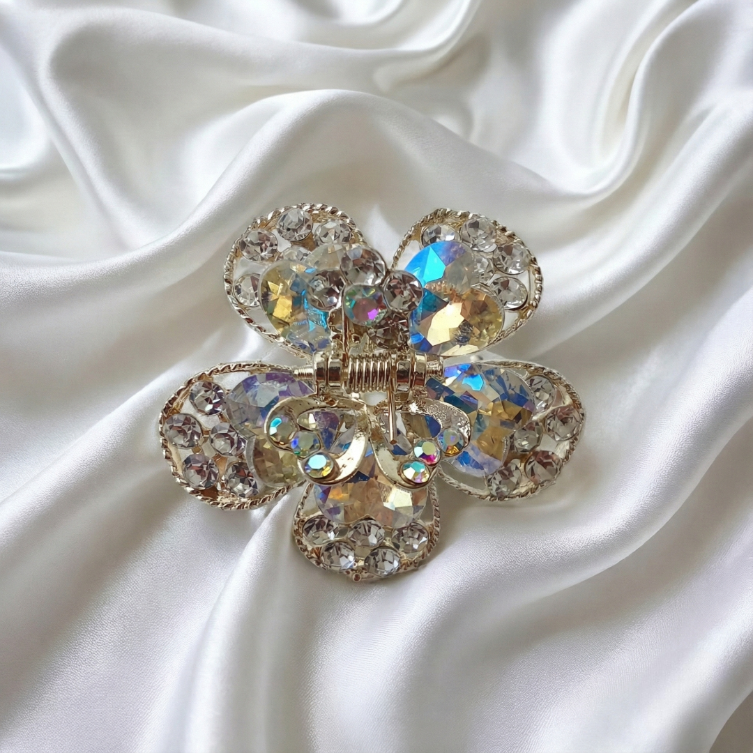 Gold-Tone Crystal Flower Hair Claw Clip in white, adorned with sparkling heart-shaped crystals.