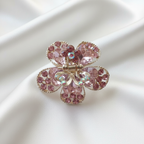Gold-Tone Crystal Flower Hair Claw Clip in pink, adorned with sparkling heart-shaped crystals.